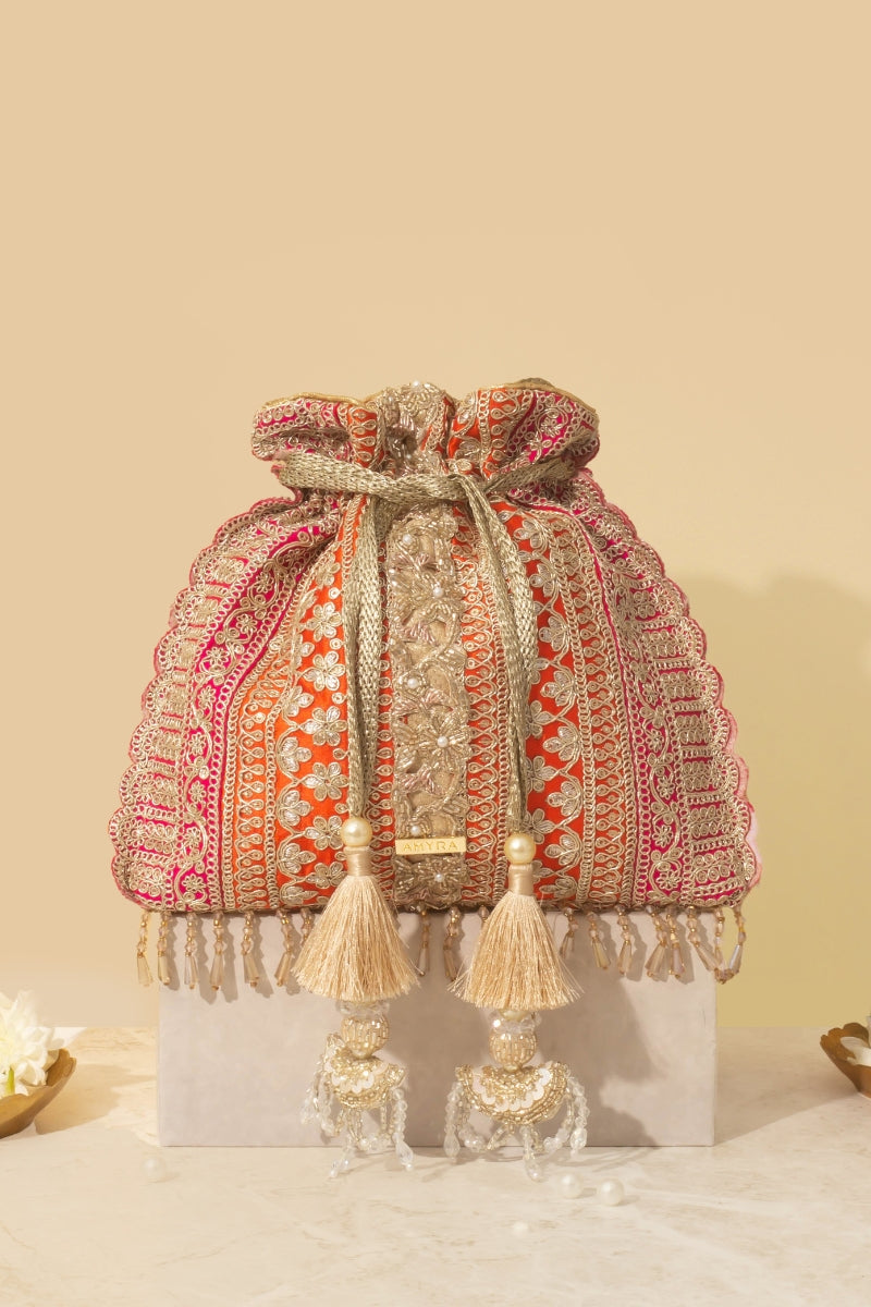 Buy AMYRA Naaz Potli Orange Pink online The AMYRA Store