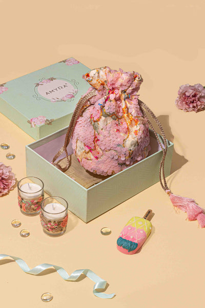 AMYRA Gift hamper - Tia Sequin Potli Bag Baby Pink - Wellness & floral candle box