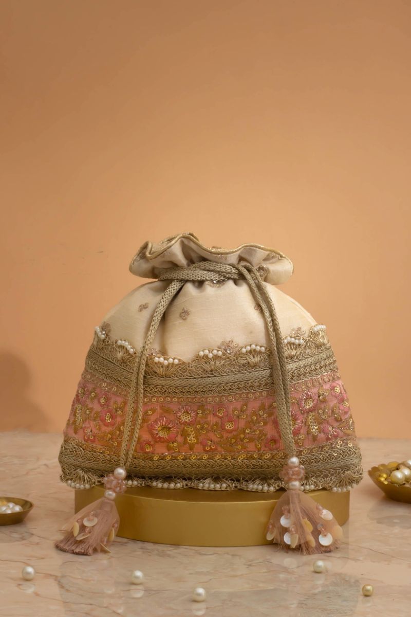 Buy AMYRA Zira Embroidered Potli Beige online The AMYRA Store
