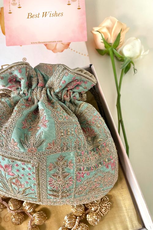 Diwali hamper Amer turquoise potli Home Urli box