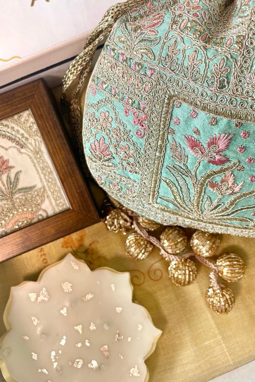 Gift hamper - Amer turquoise potli - Home & Urli box