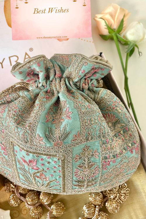 Gift hamper - Amer turquoise potli - Aroma & Urli box