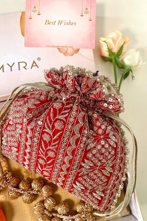 Gift hamper - Mirai embroidered red potli - Gourmet & Candle box