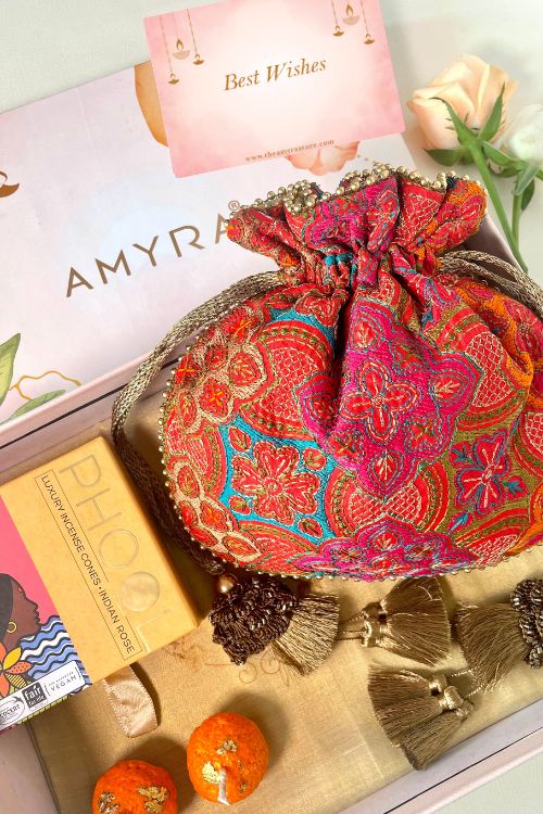 Gift hamper - Amna embroidered red potli - Aroma & Candle box
