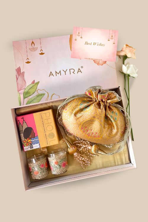 AMYRA Gift hamper - Kashi yellow banarasi silk potli - Aroma & Floral candle box