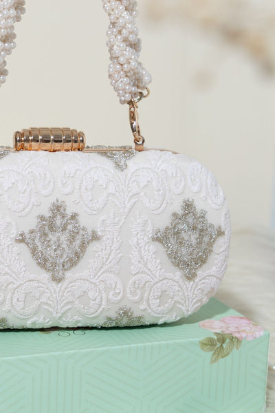 AMYRA - Nura capsule clutch- White