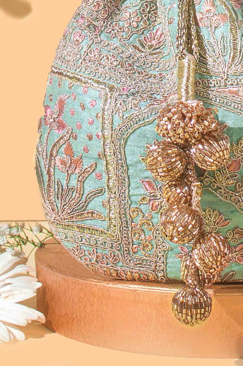AMYRA Amer turquoise potli