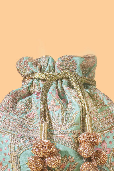 AMYRA Amer turquoise potli