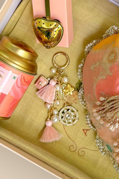 Rakhi Hamper - Abstract Art Banarasi Potli - Peach - Care Box