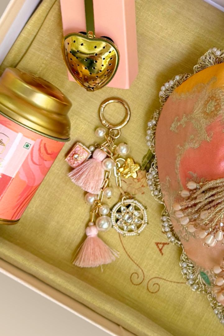 Gift Hamper - Abstract Art Banarasi Potli - Peach - Care Box