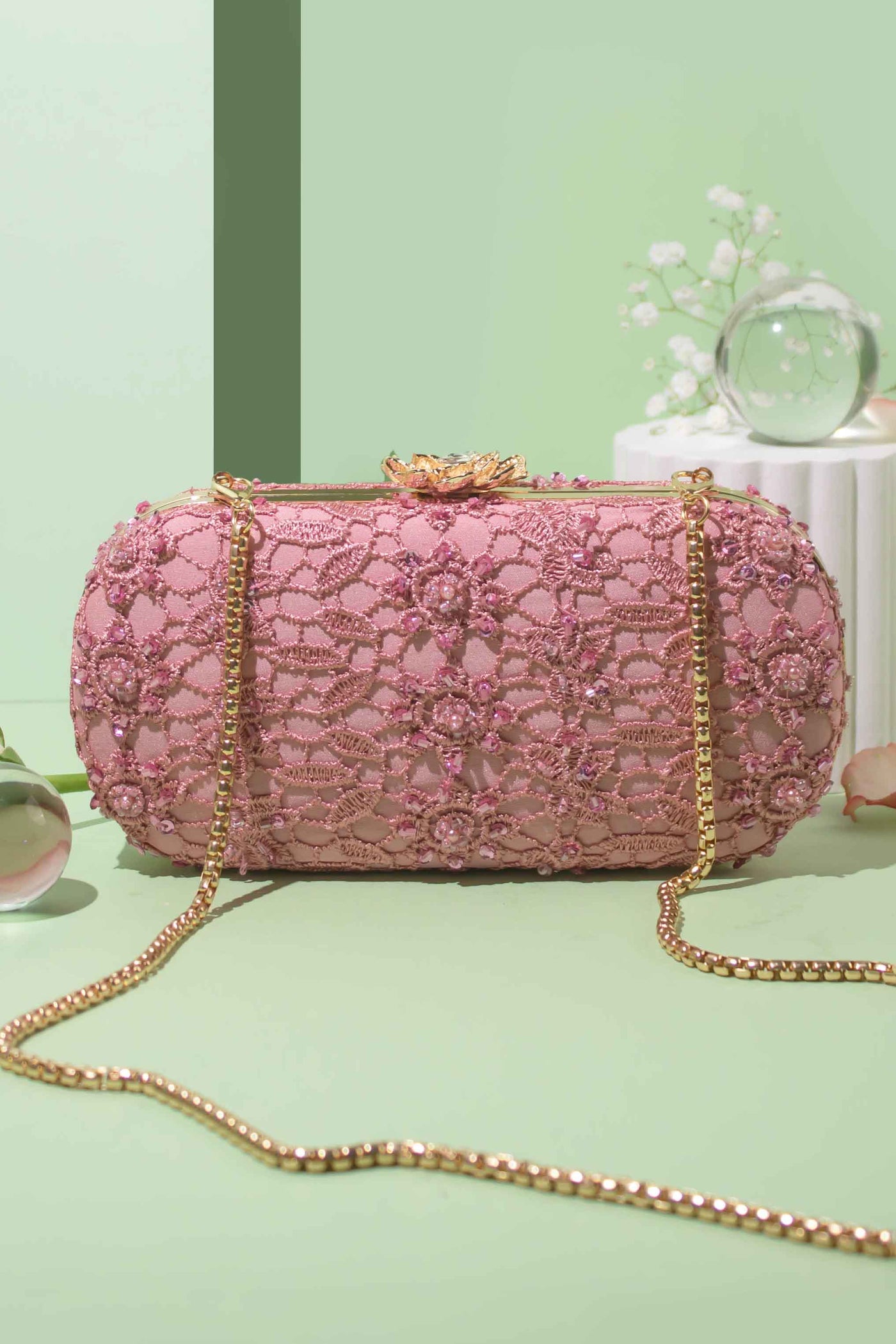 AMYRA Cordon Capsule Clutch Pink