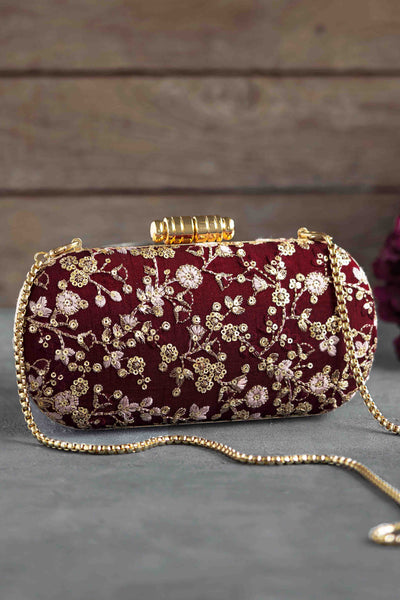 AMYRA Elan maroon silk capsule clutch