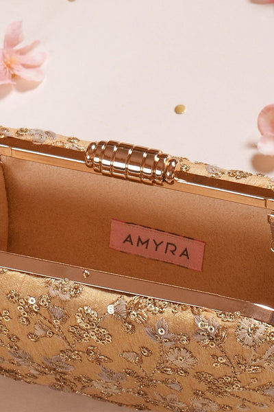 AMYRA Elan gold silk capsule clutch