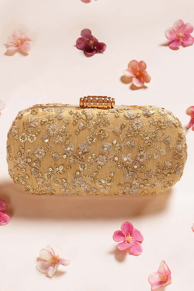 AMYRA Elan gold capsule clutch