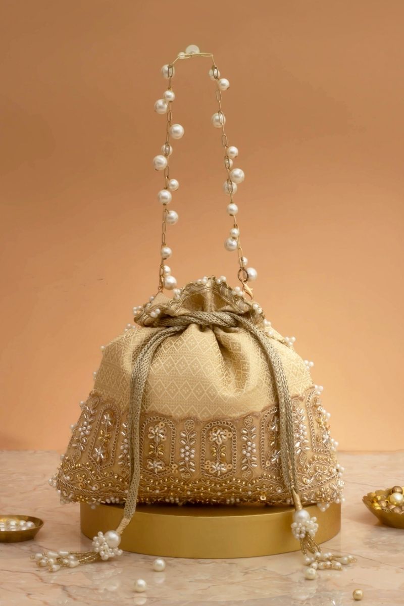 Geet Brocade Embellished Potli - Cream