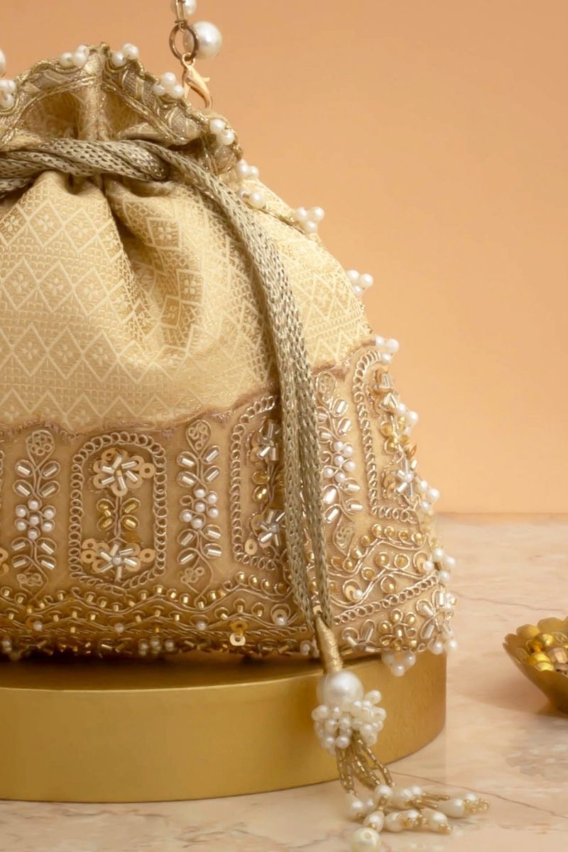 Geet Brocade Embellished Potli - Cream