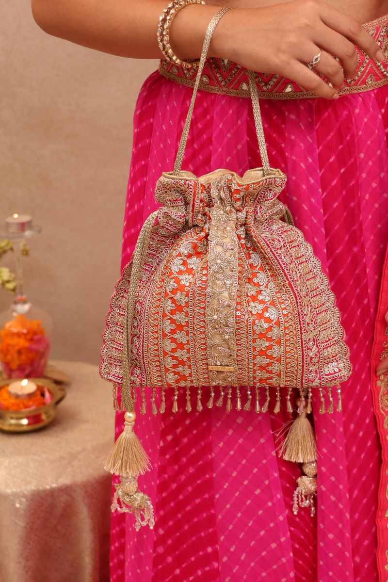 Buy AMYRA Naaz Potli Orange Pink online The AMYRA Store