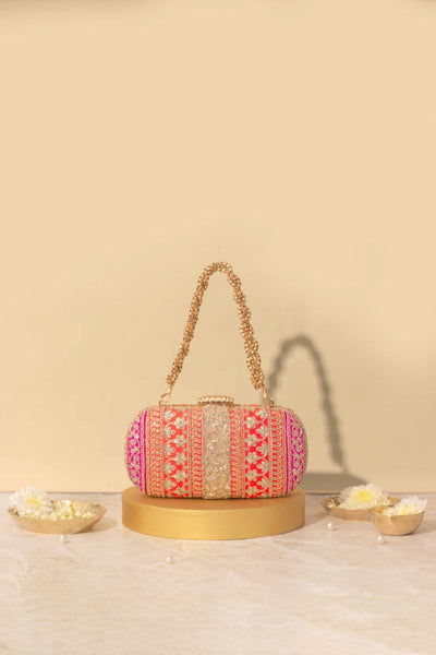 Naaz Capsule clutch - Orange and Pink