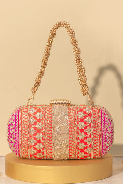 Naaz Capsule clutch - Orange and Pink