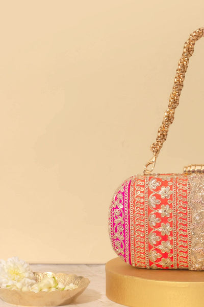 Naaz Capsule clutch - Orange and Pink