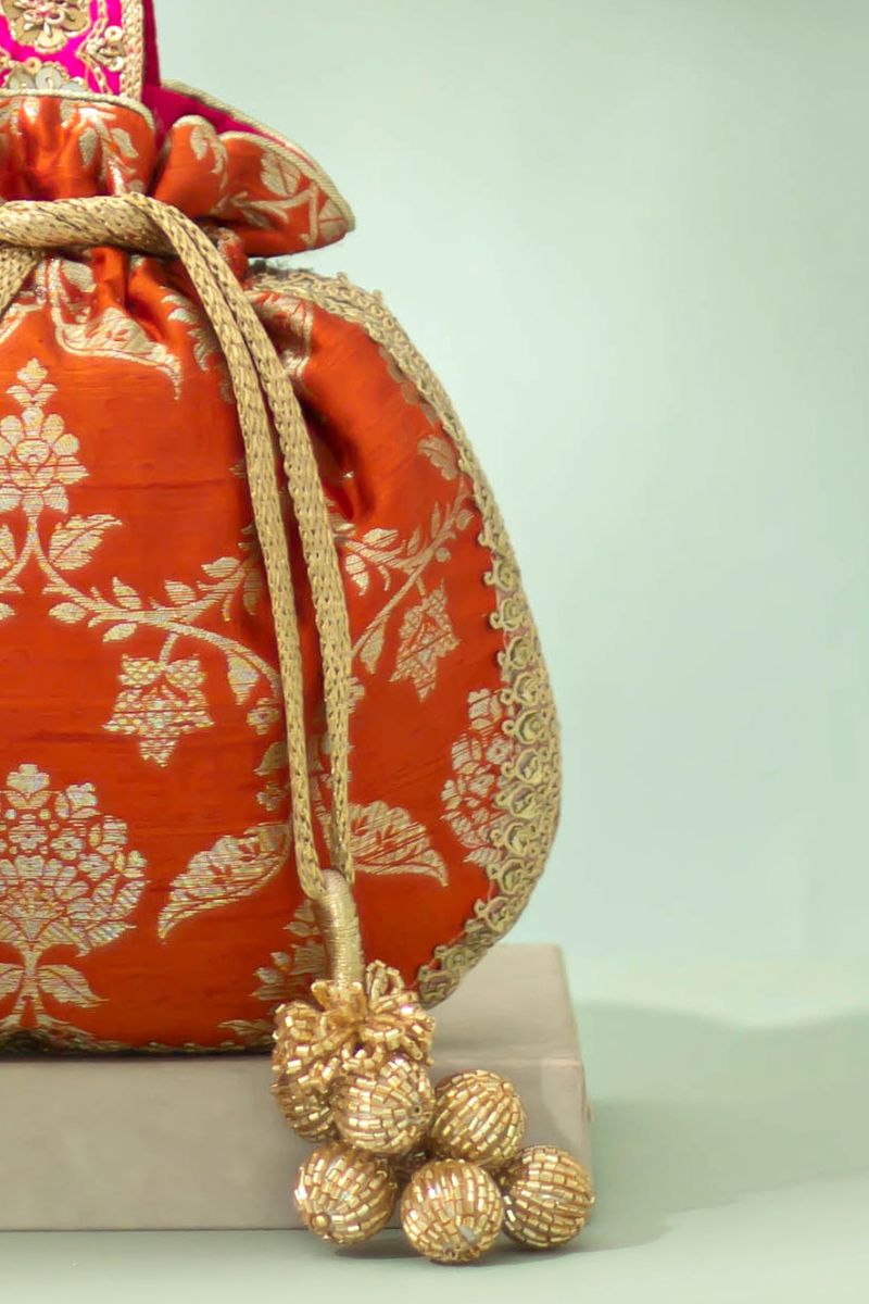 Taroob Pure Raw Silk Embellished Potli - Rust Orange