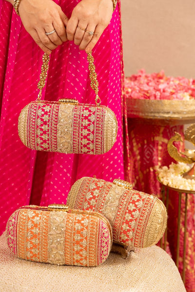 Naaz Capsule clutch - Orange and Pink