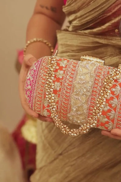 Naaz Capsule clutch - Orange and Pink