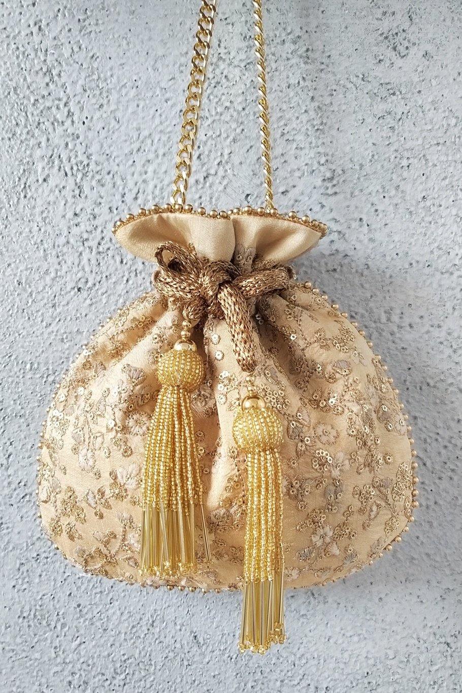 AMYRA Gold Floral Potli bag With Metal Sling