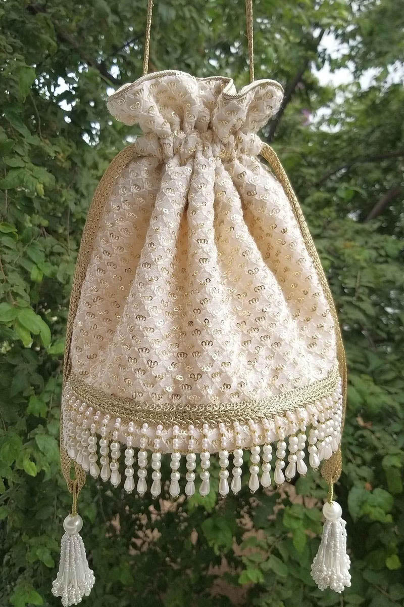 Amyra Fontana pearl potli wedding favors