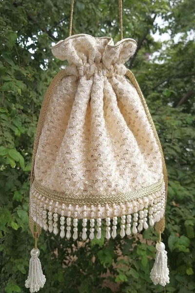Amyra Fontana pearl potli wedding favors