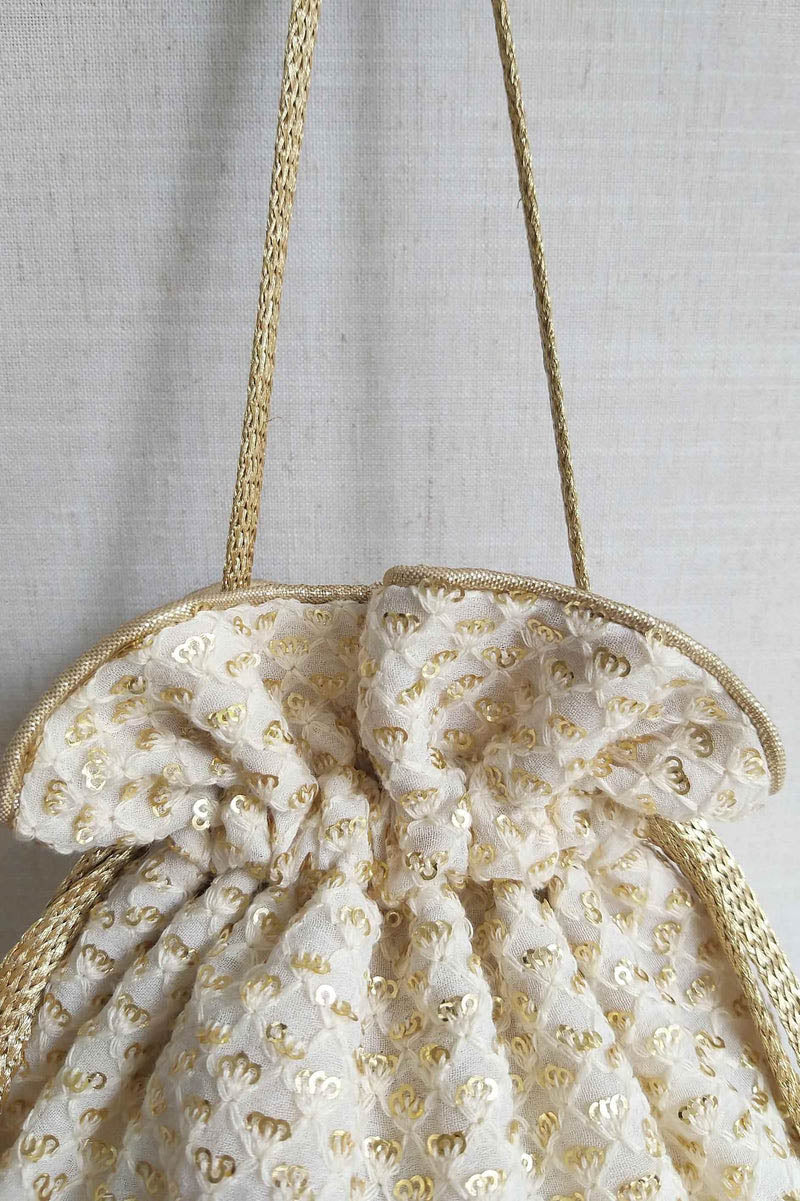 Amyra Fontana pearl potli wedding favors