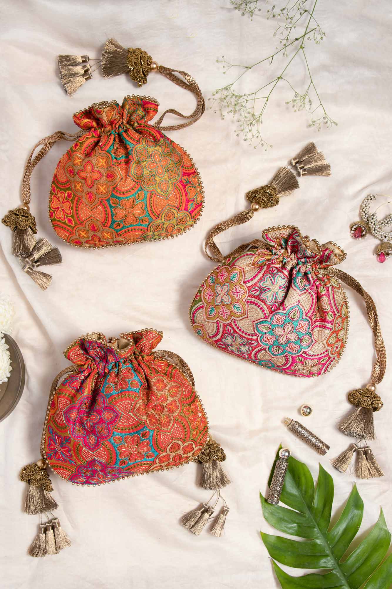 AMYRA Amna Embroidered Potli bag - Cream