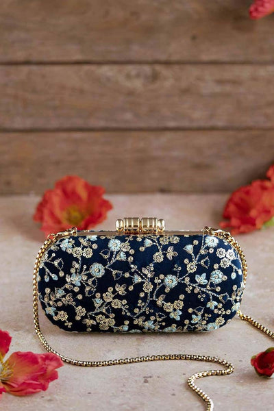 AMYRA Elan Navy silk capsule clutch