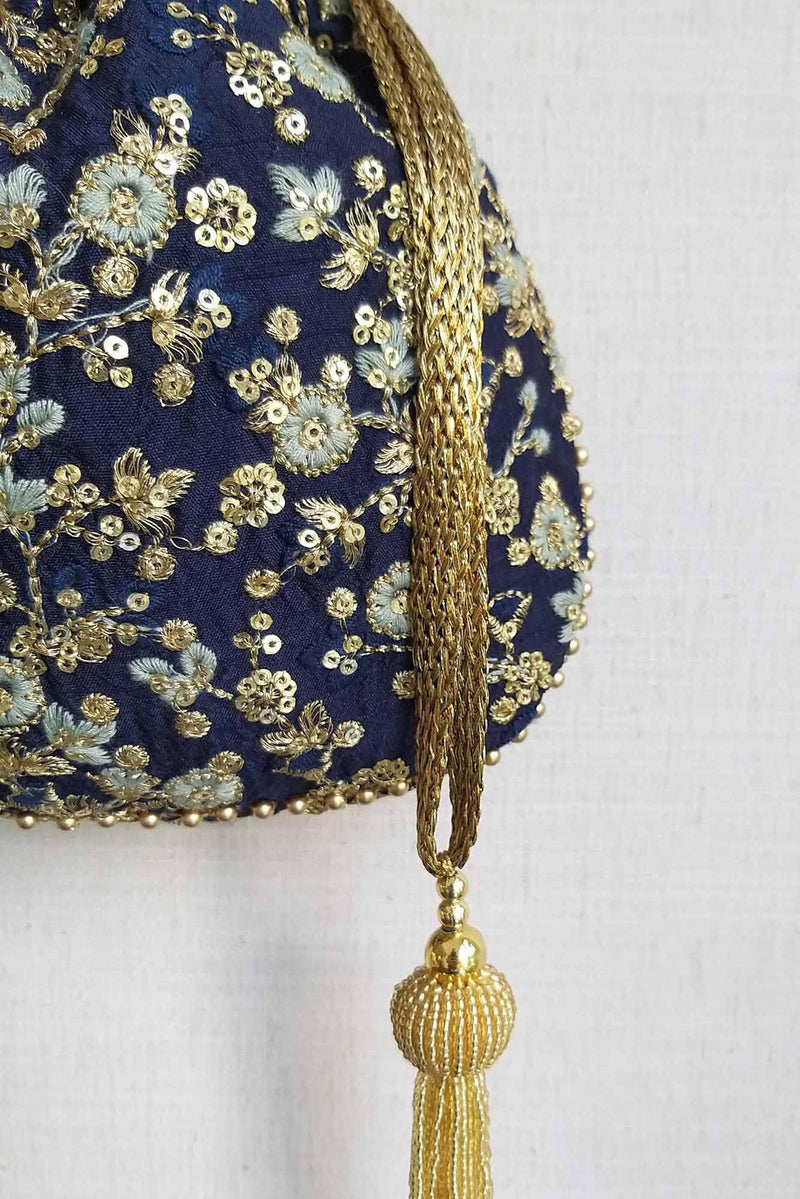 AMYRA Elan Navy Silk Potli bag With Metal Sling