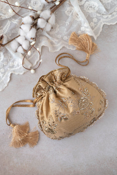 AMYRA Gold scallop potli bag