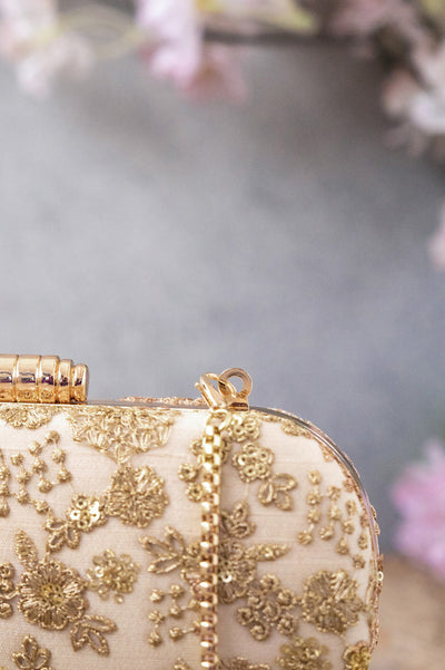 AMYRA Ada capsule clutch
