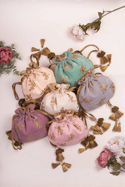 Amyra pastel velvet potlis