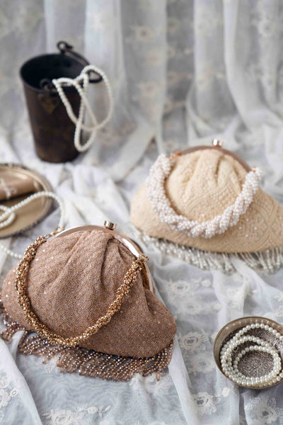 AMYRA Oro vintage purse