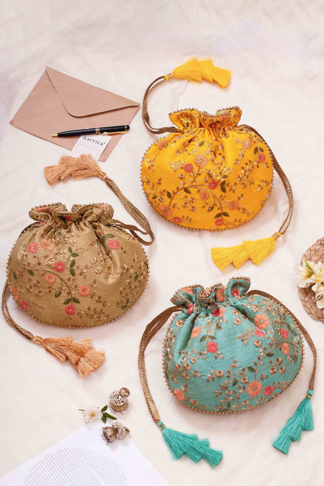 Buy AMYRA Floral Creeper Potli Bag Yellow online The AMYRA Store