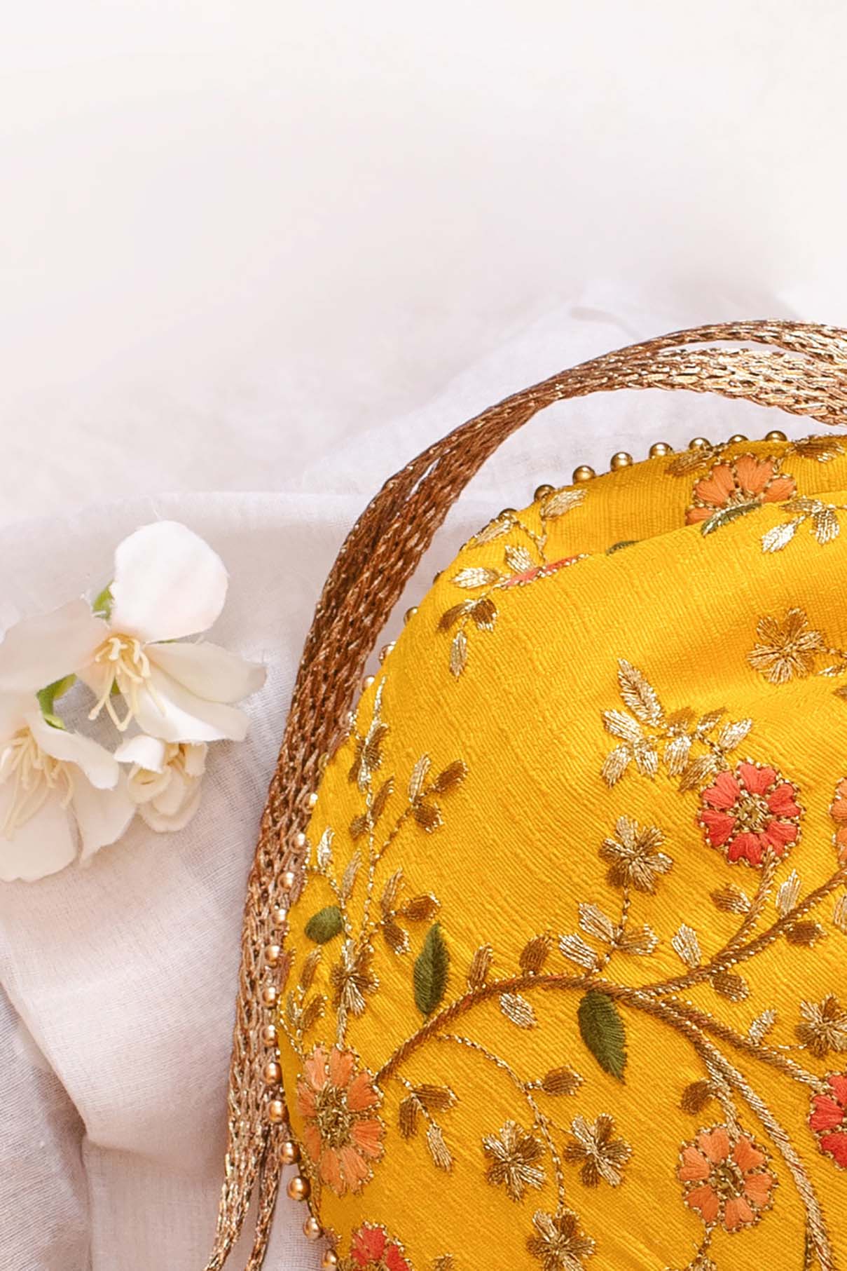 AMYRA Floral creeper potli bag yellow