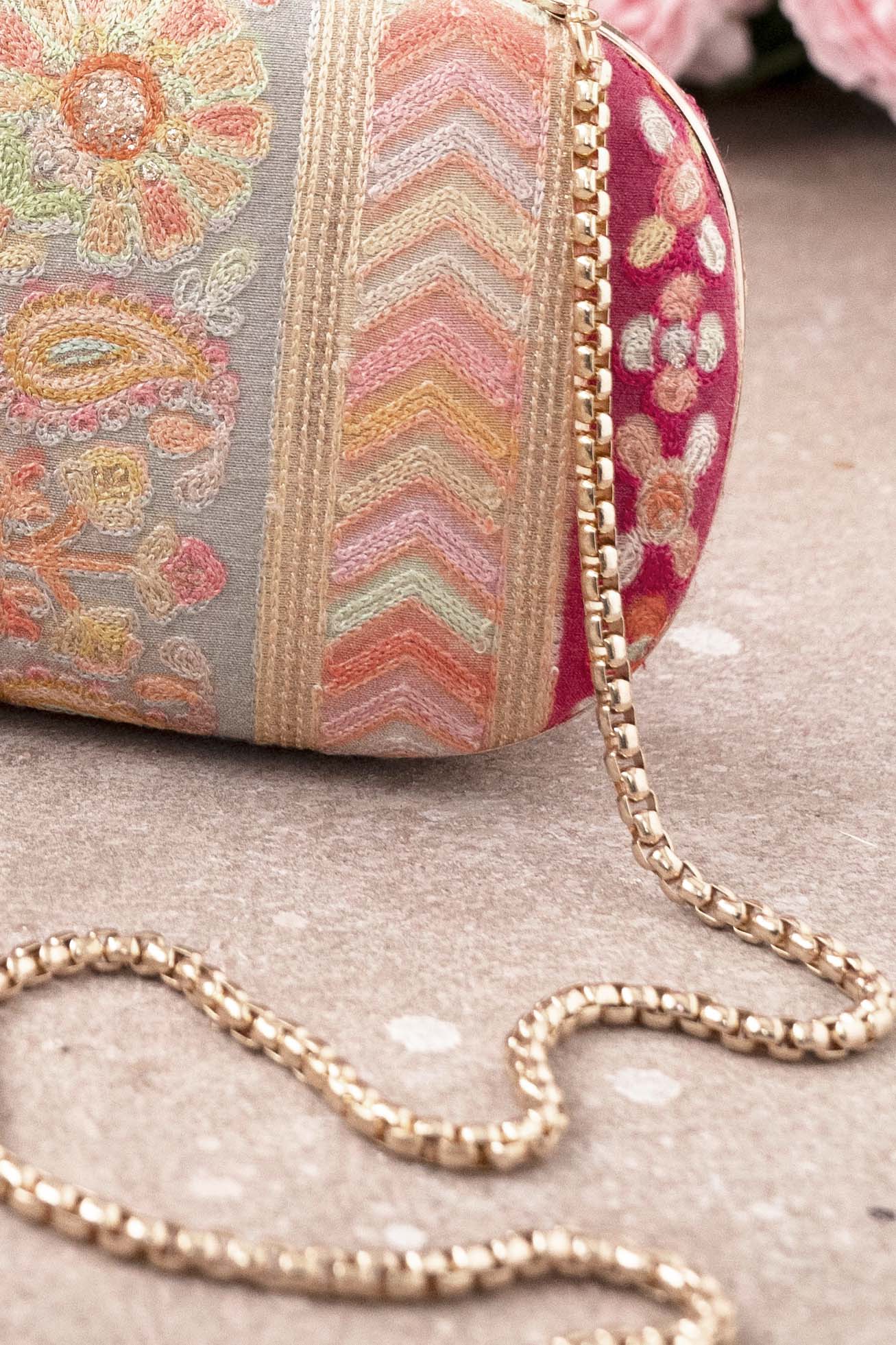 AMYRA Havana Capsule clutch