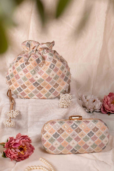 AMYRA Aza pastel embroidered potli - white