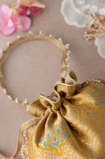 Amyra kashi mustard pure banarasi silk potli