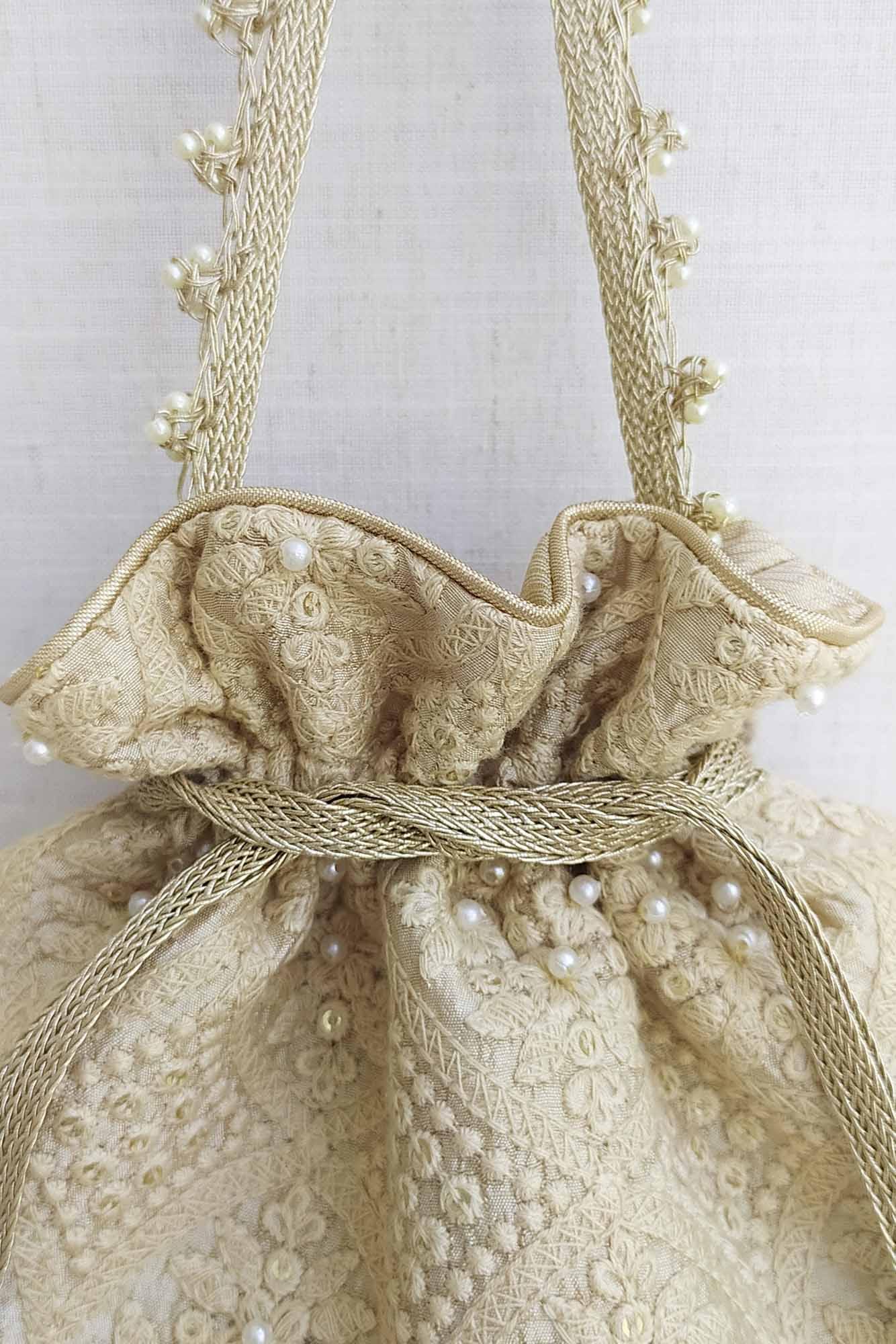 AMYRA Oyster Beige Pearl Embroidered Silk Potli bag