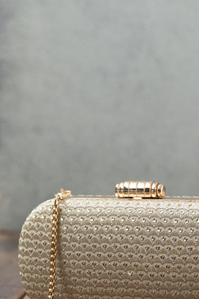 AMYRA Champagne capsule clutch