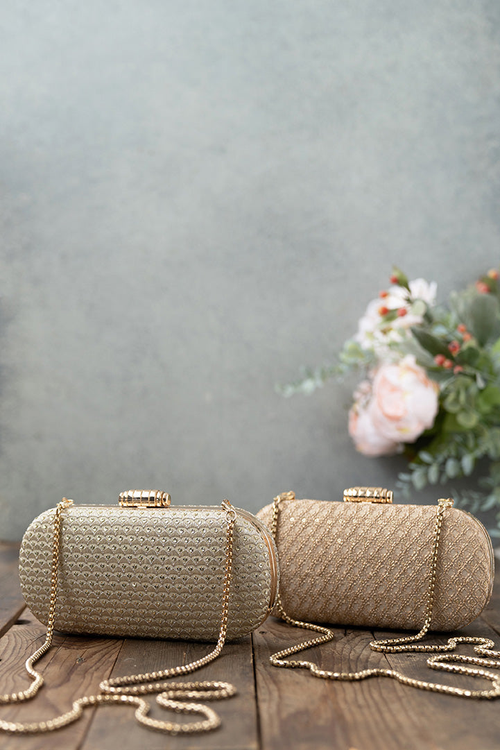 AMYRA Oro gold sequin clutch