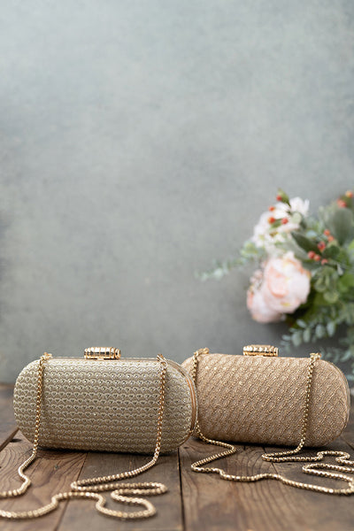AMYRA Oro gold sequin clutch