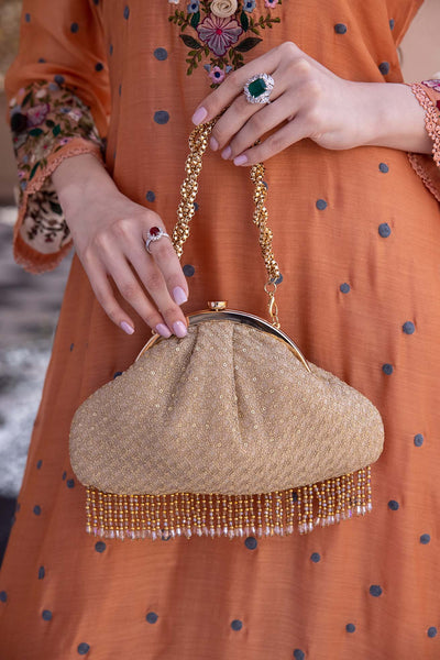 AMYRA Oro vintage purse