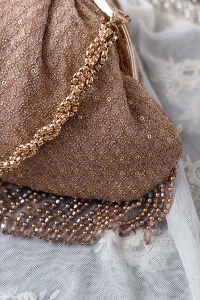 AMYRA Oro vintage purse