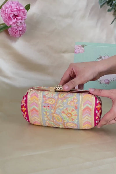 AMYRA Havana Capsule clutch